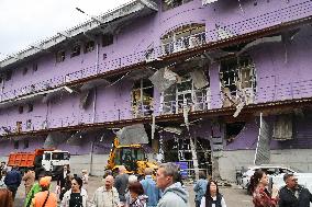 Shopping center, supermarket and residential building damaged by shelling in Kyiv